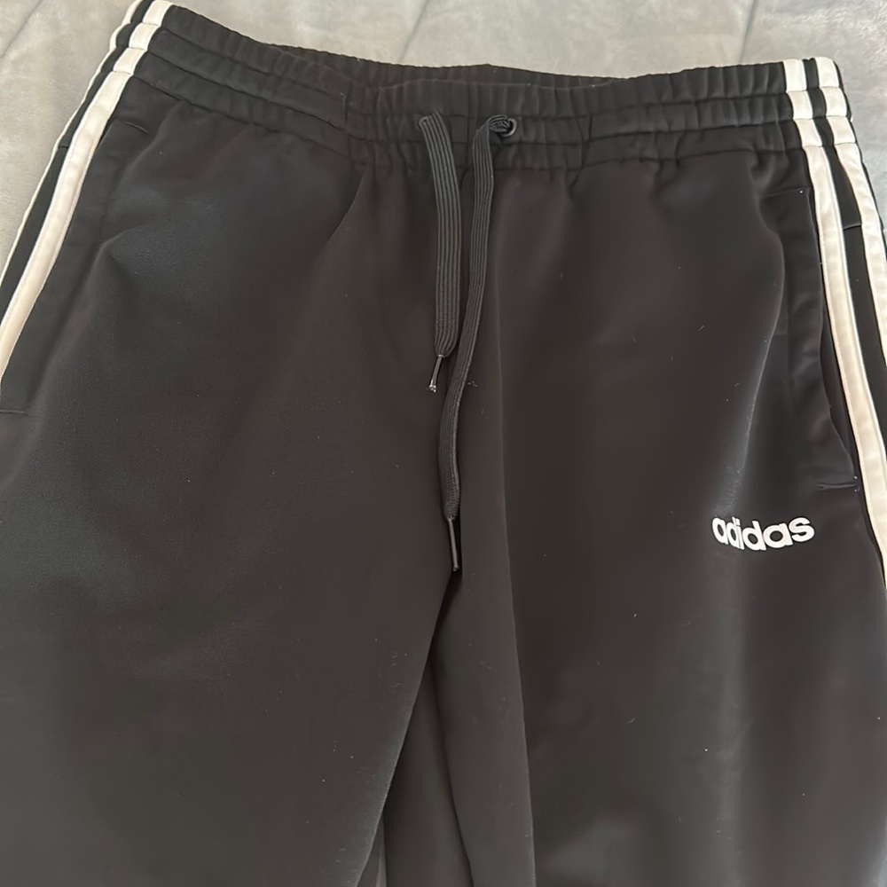 Black and white adidas joggers